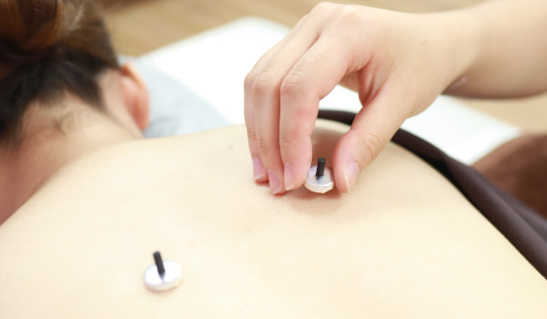 お灸背中